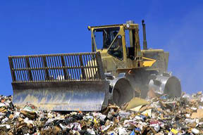 Bulldozer compacter working in a landfill in Boise, Idaho.