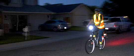 BIKE NERD with lights, reflective vest and helmet.