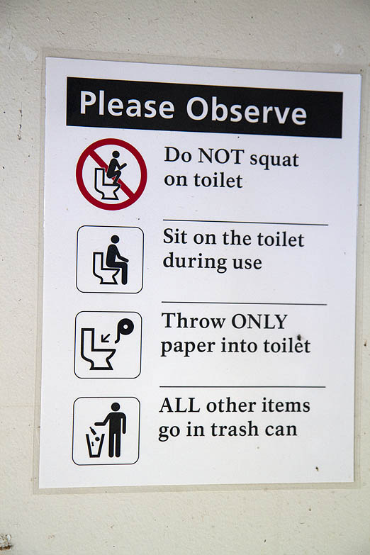 With all the regulations, rules, and suggestions put forth by the United States Government, it was only a matter of time before they told folks how to take a crap! This sign in an outhouse at Yellowstone National Park seems like it came right out of the Donald Trump playbook.  The GUARDIAN got a chuckle reading it and decided it has to be better than most graffiti that otherwise decorates public poopers.